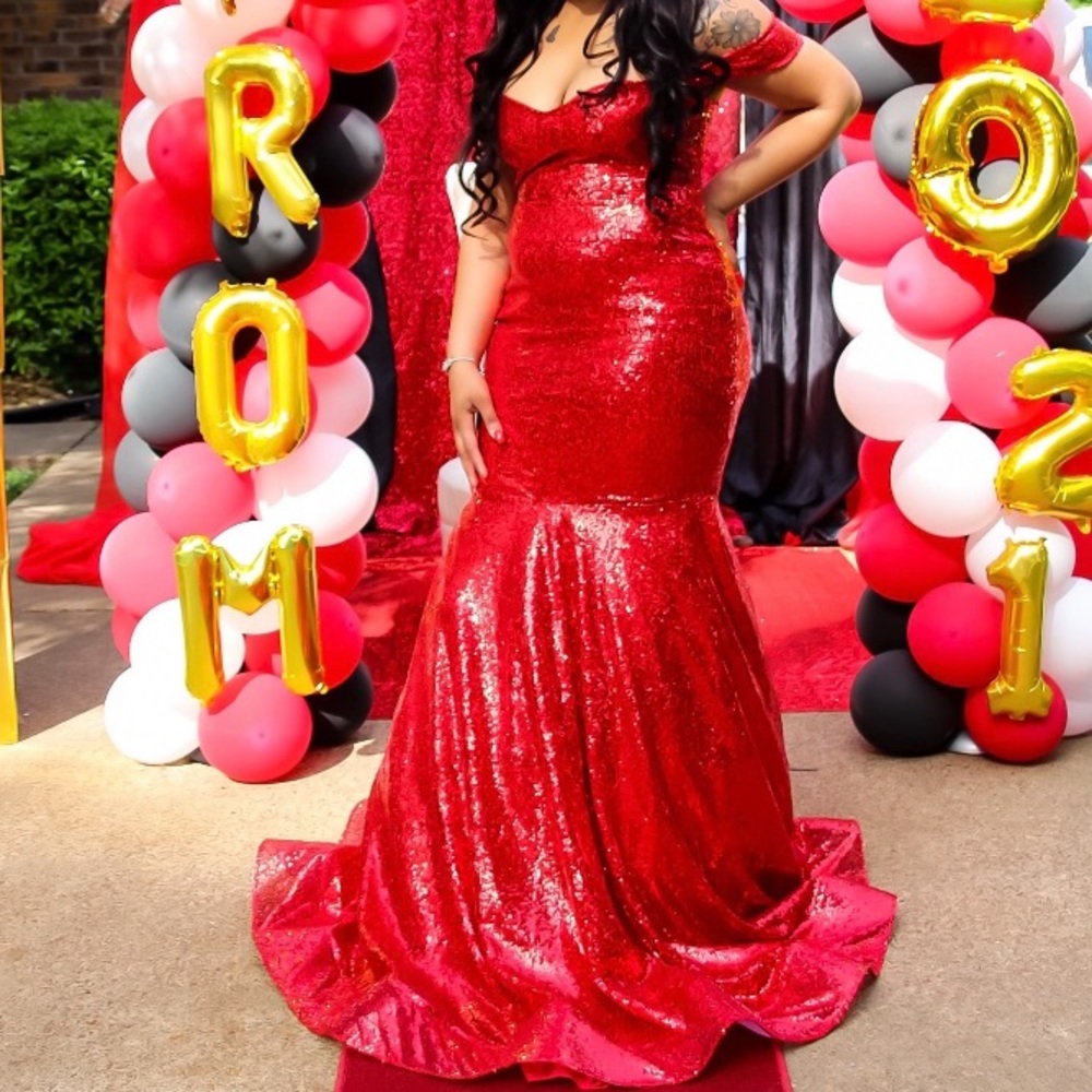 My size 10 prom dress , very knew only worn to take pictures .